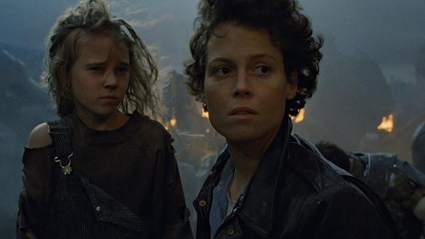 Carrie Henn as Newt and Sigourney Weaver as Ripley in "Aliens" (1986).