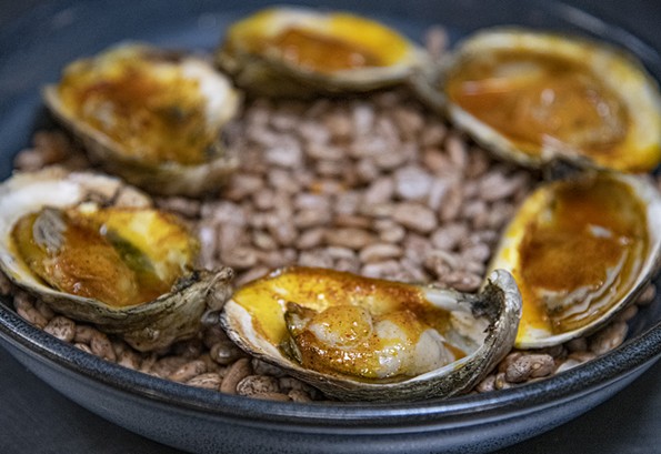 Cocodrilo dish featuring bone marrow, chile butter and wood grilled oysters. - SCOTT ELMQUIST
