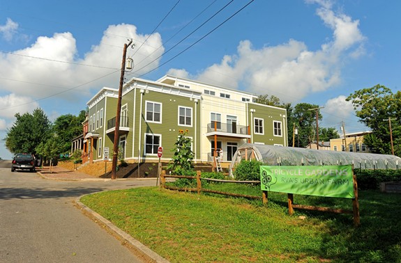 The recently completed apartment building at 1001 Bainbridge St., a 12-unit project developed by Urban Development Associates, is across the street from the urban farm Tricycle Gardens. - SCOTT ELMQUIST