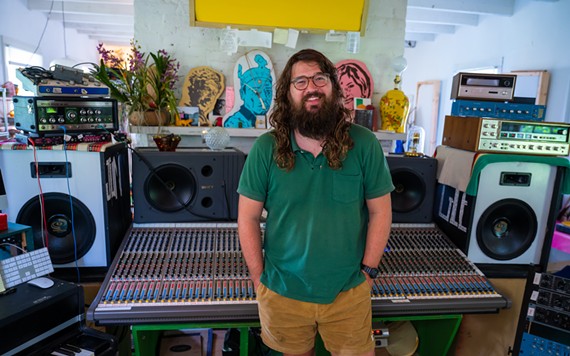 Matthew E. White stands inside his studio at Montrose. White is the headliner for this year's final Friday Cheers at Brown's Island.