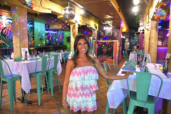 Adrienne Londoño and her husband have created their own  Miami-style, neon oasis with Papi's restaurant and club at 1407 E Cary St. "We wanted to recreate that fun, South Beach lifestyle," she says. "And give our queer friends a place that they can just be themselves."