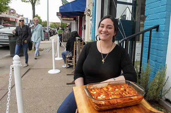 Angela Petruzzelli, founder, owner and chef of Sprezza Cucina, sits by her family's popular lasagne dish. Soon she'll be introducing Richmonders to more diverse Italian fare at her new brick and mortar at 111 Virginia St. in Shockoe Slip.  We can't wait.