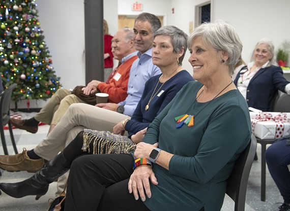 The president and chief executive officer of CARITAS, Karen Stanley (far right) is set to retire at the end of December, after two decades spent transforming one of the area's most reliable and caring safety nets for the unhoused.