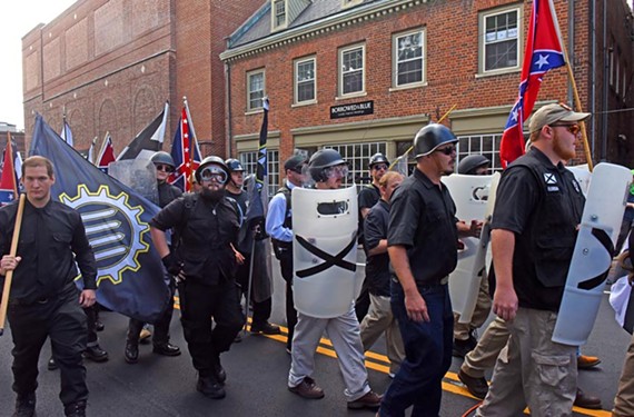Neo-Nazis marching through Charlottesville on Saturday, Aug. 12.