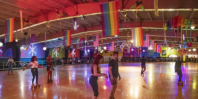 Pride flags hang above the rink floor at Rollerdome. Virginia Pride is sponsoring a Rainbow Roll skate night with drag queens and a costume contest this Sunday, May 15. Moving forward, it will be held the third Sunday of every month.