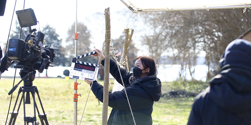 Cecilia Nguyen, graduate from Oakwood Arts JET’s second cohort working in the camera department on the set of OA JET production’s short film “On The Night Wind.”