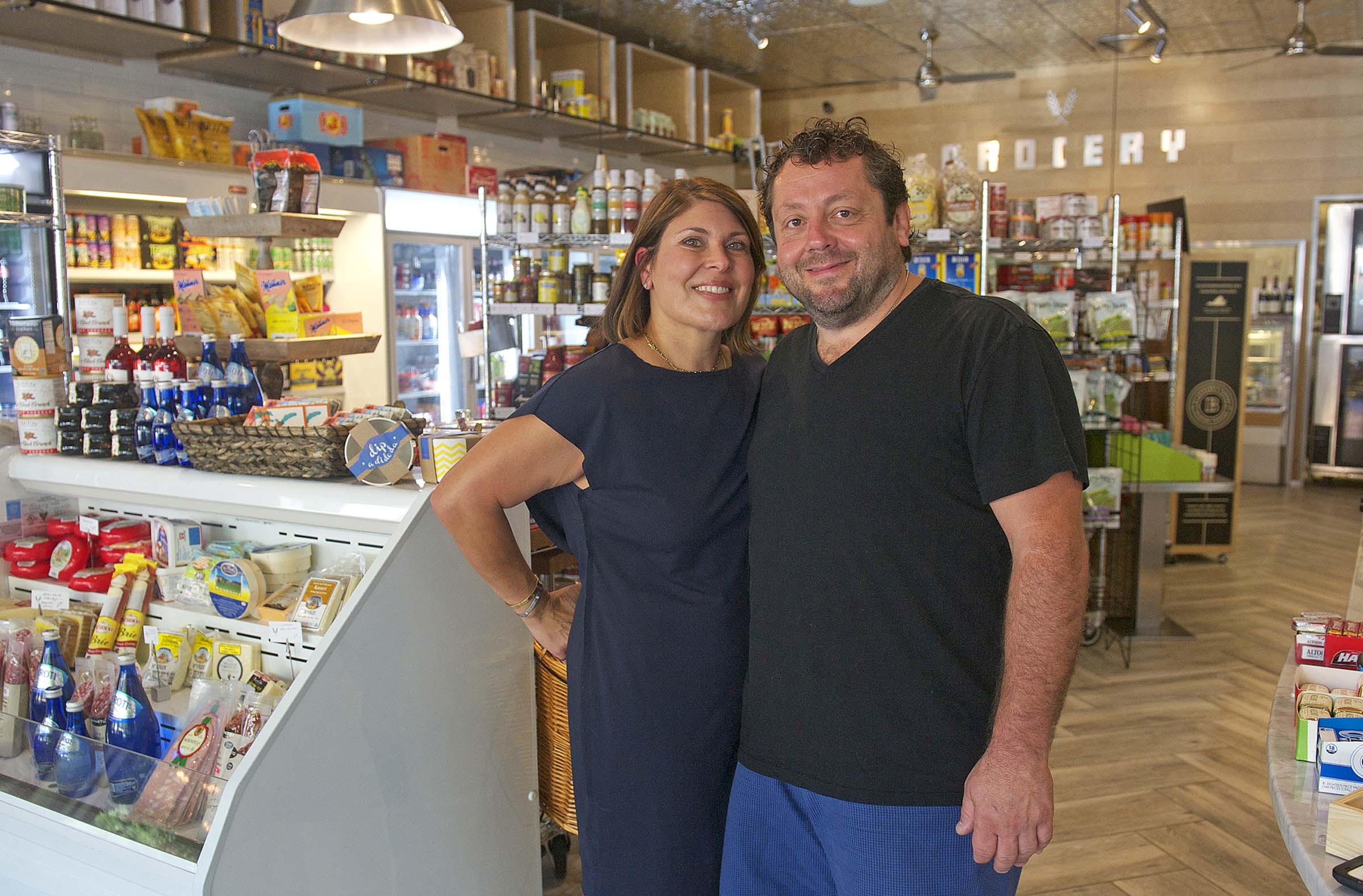 Katrina and Johnny Giavos started their local restaurant empire 25 years ago with the Sidewalk Café. - SCOTT ELMQUIST