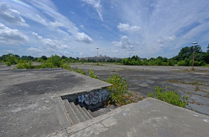 Slabs of concrete are all that remain of Azalea Bowl on Brook Road. In the distance is the Westminster Canterbury Richmond retirement community. - SCOTT ELMQUIST