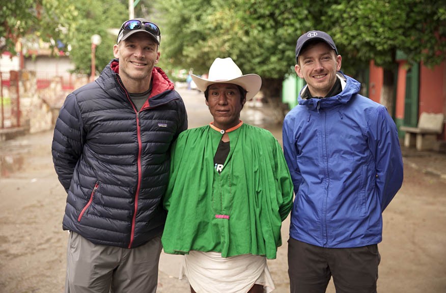 Health Warrior’s co-founder, Nick Morris, and its chief financial officer, Austin Harris, meet with Arnulfo Qimare, the Tarahumara runner made famous in “Born to Run,” on a visit last year to the Barrancas. Qimare competed in the 2016 Boston Marathon wearing handmade huaraches and traditional garb. - HEALTH WARRIOR