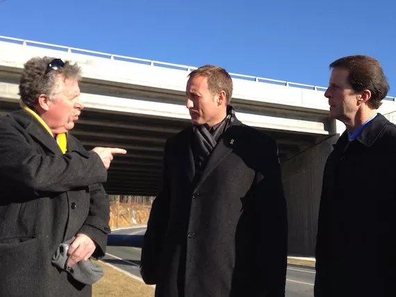 Bill Estabrooks, Peter MacKay and Peter Kelly (left to right) celebrate the opening of the over-budget Washmill underpass.