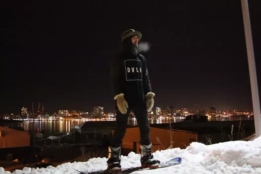 City Lights: Ian MacArthur sizes up the jib as he waits for a tow in. - AARON WILLIAMS