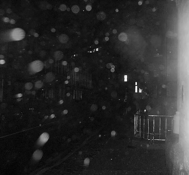 Facing the rain on Barrington Street. - CHRIS SMITH