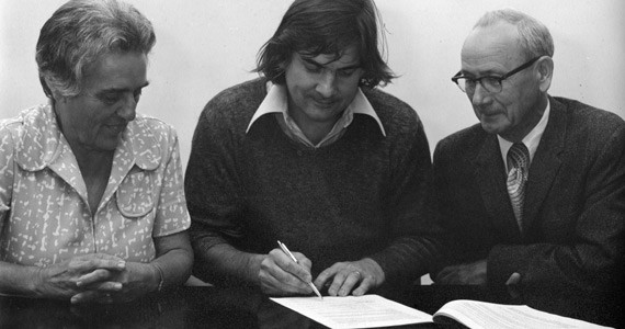 Lib Connor, secretary of the NSCAD board, president Garry Neill Kennedy and board chair Darrell Mills signing the lease for the downtown campus in 1976. - COURTESY ANNA LEONOWENS