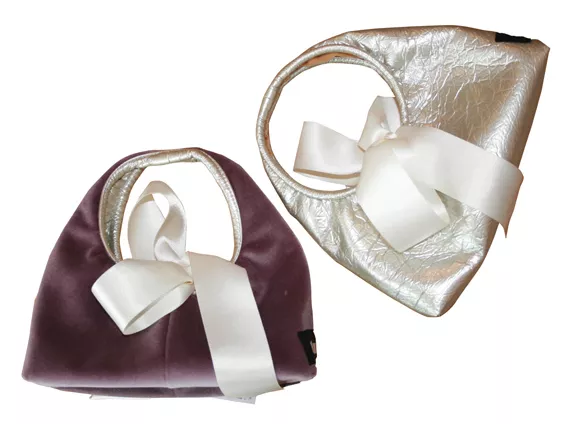 MORE PERSONAL BAGGAGE Turbine reversible hobo-bags, $42, Turbine Boutique, 1475 Lower Water, 429-0986.