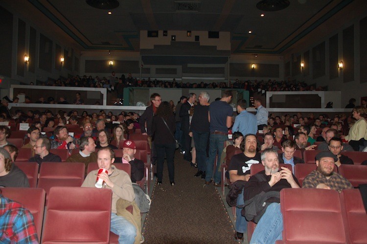 The crowd, ready for blood! Including the silver-haired gent, producer Niv Fichman