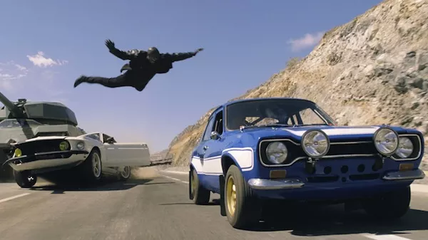 This guy who had to jump out of his car before the tank squashed it isn't just fast, he's probably also pretty darn furious.