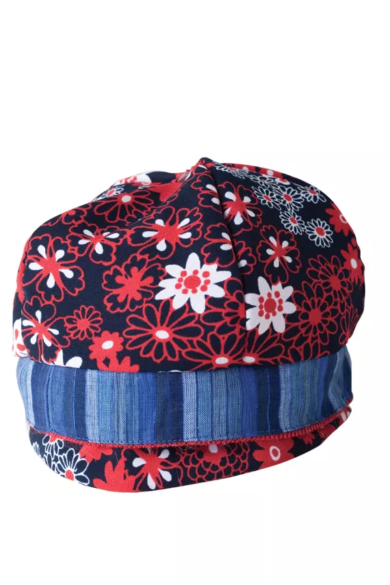 TWICE AS FAR AHEAD - Meverisble’s reversible hats, $58, Love, Me Boutique, - 1539 Birmingham, - 444-3668