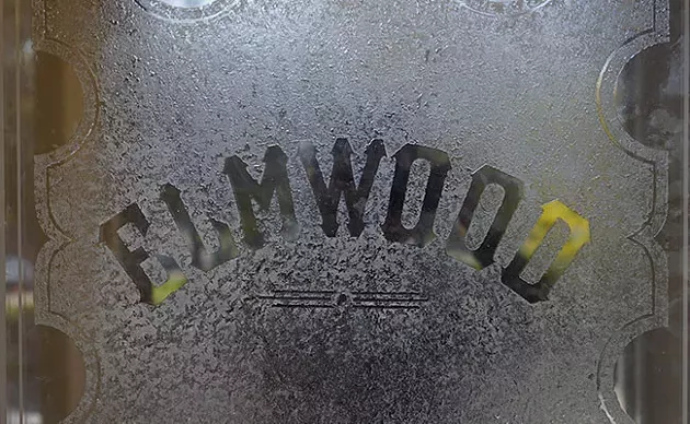 Frosted glass greets residents at the building’s entrance. - IAN SELIG
