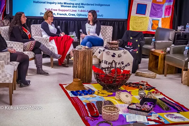 Vanessa Brooks, centre, speaks with MMIWG inquiry Commissioner Qajaq Robinson about her sister, Tanya Brooks. - STEPHEN BRAKE