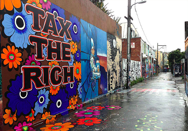 "Tax The Rich" mural by Megan Wilson on Clarion Alley San Francisco. - VICTORGRIGAS VIA WIKICOMMONS