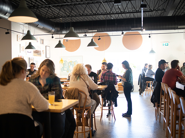 The new North Brewing is a 7,500-square foot industrial space that feels homey, almost cozy. - RILEY SMITH