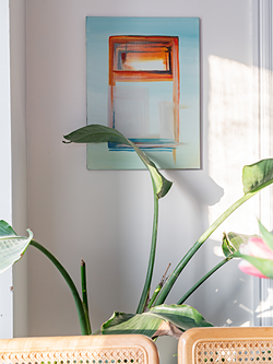 The colours in this painting by Manning's friend Derek Lewis happen to tie the kitchen, dining room and living room together, even though "the painting came first, the space came second." - RYAN WILLIAMS