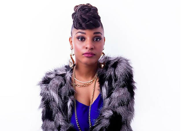 Reeny Smith appears on David Myles's not-so-late-night talk show via a live Youtube sesh Thursday. - MNEODESIGNS