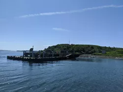 The big wharf sits atop a historic one—preserved once found by archaeologists before new construction began. - CAORA MCKENNA