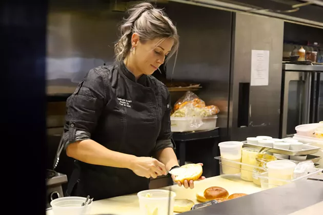 Stephanie Brown preps for another busy day of Burger Week 2020. - THE COAST