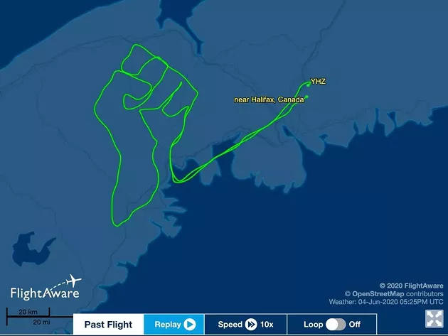The Black Lives Matter fist raised high—thousands of metres high—over Nova Scotia. - FLIGHTAWARE