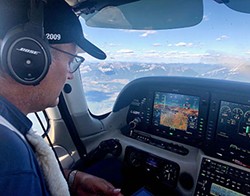 Pilot Picasso Dimitri Neonakis in his Cirrus SR22 plane/paintbrush. - SUBMITTED