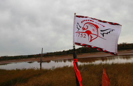The Sipekne'katik flag waves at the proposed brine storage site. - VIA THE COUNCIL OF CANADIANS
