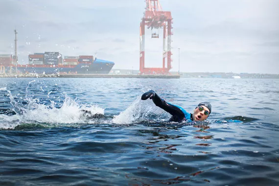 Writer Hillary Windsor braves the cold, mostly-clean waters of Halifax Harbour off of - Black Rock Beach. - LENNY MULLINS