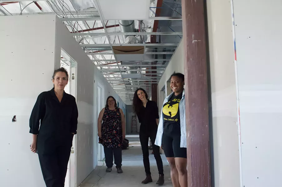 Artist Emily Falencki, artists and Wonder'neath co-founders Heather Wilkinson and Melissa Marr and artist/Wonder'neath board of directors president LaMeia Reddick took The Coast on an exclusive tour of 2482 Maynard this week. The new arts space will open sometime this fall—perhaps as early as September, they estimate. - MORGAN MULLIN PHOTO