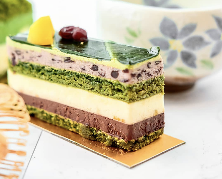 The Opera Cake includes 7 layers of matcha almond sponge cake, ganache,yuzu cream, and matcha buttercream. - TSUJIRI INSTAGRAM