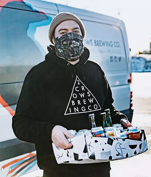 Doing deliveries during a pandemic, Eric Daponte hears “I’m so happy to see you!” a lot. - JAMES MACLEAN