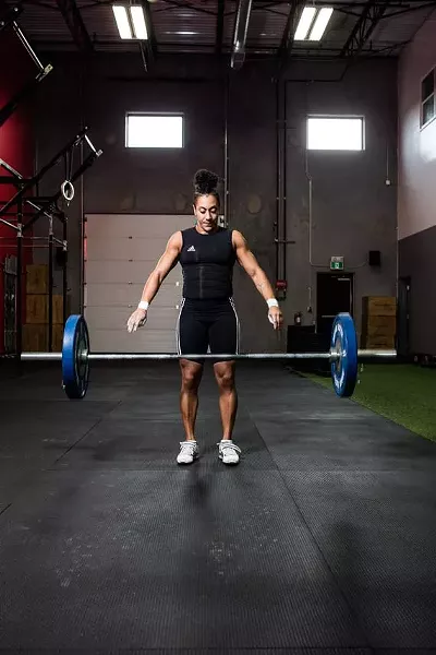 Clarke is either dropping this barbell, or using telepathy to raise it. We suspect telepathy. - RILEY SMITH