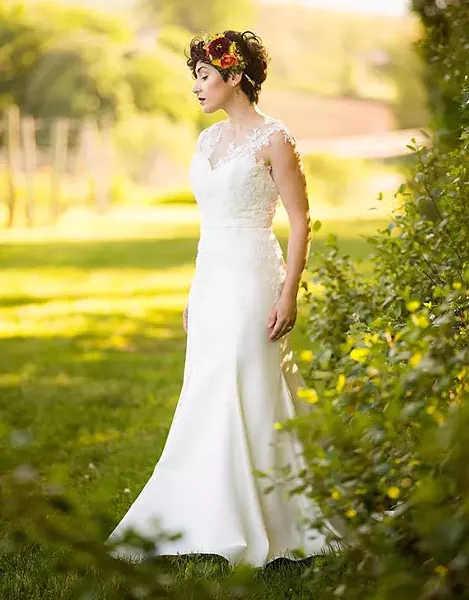 The Charlotte: A feminine, curve-hugging silk satin gown, covered in hand-beaded floral lace appliqués. “I wanted to create a gown that would showcase beautiful floral details that could stand on their own but also transition into the silhouette of the gown,” - says Tuttle. - CHANTAL ROUTHIER PHOTOGRAPHY