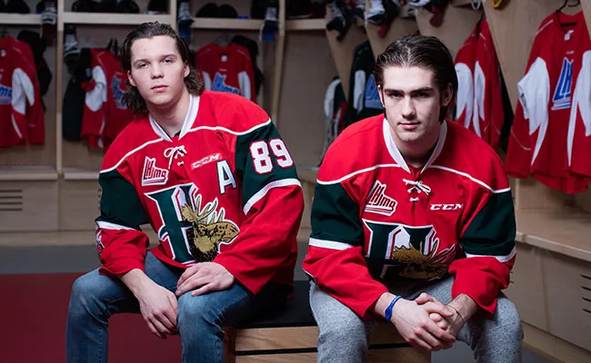 As hockey stars, Finnish centre Otto Somppi, left, and Filip Zadina, a right winger from the Czech Republic, have to do things like pose for photos before a Mooseheads practise. - RILEY SMITH