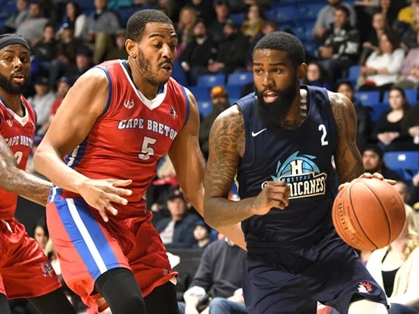 Halifax Hurricanes' Terry Thomas finds an open lane against the Cape Breton Highlanders' Theron Laudermill. Fans driving to Saturday's playoff climax might not be so lucky. - HALIFAX HURRICANES