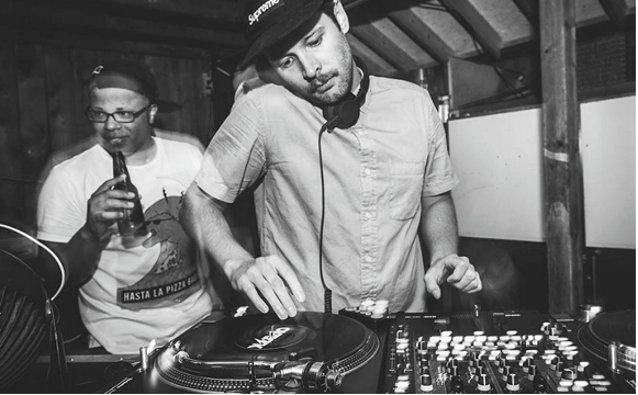 DJ T-Woo is Doin' Damage at Lion & Bright (see 3). - ANDREW DONOVAN/PHOTOTYPE