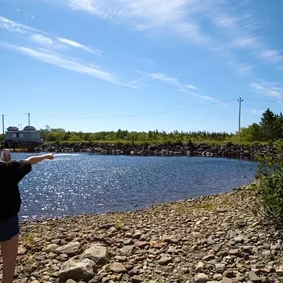 Nicole Gnazdowsky at the NS Power Marshall Falls reservoir in Sheet Harbour, on FaceTime with a witness who saw her brother enter the water.