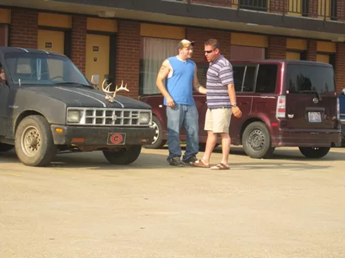 yes, this is a truck with a pair of antlers attached. this photo took some stealthy work - the men were large and shouted a lot. yes, this is a truck with a pair of antlers attached. this photo took some stealthy work - the men were large and shouted a lot.