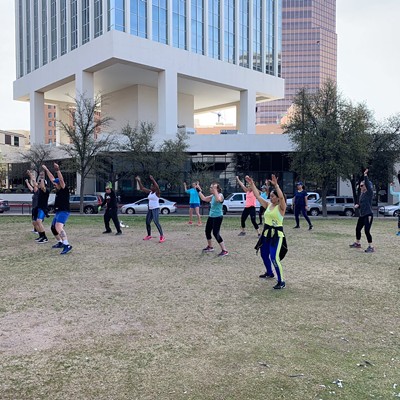Inspired Fitness hosting a free class in the park at Jacome Plaza Downtown.
