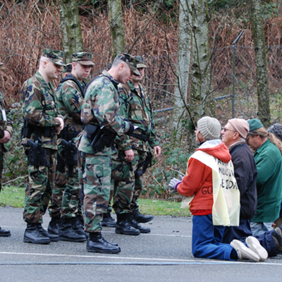 Activists blocking the road into the Bangor Trident nuclear submarine base in Washington state