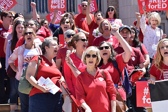Tucson High educators rally in front of the downtown high school on Saturday, April 14.