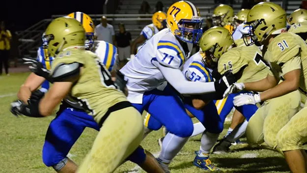 Marana rising senior offensive lineman Jordan Morgan throws a block during a game in 2017. - COURTESY PHOTO