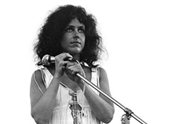 Grace Slick staring out over the crowd at the start of Jefferson Airplane’s set. - TIM FULLER