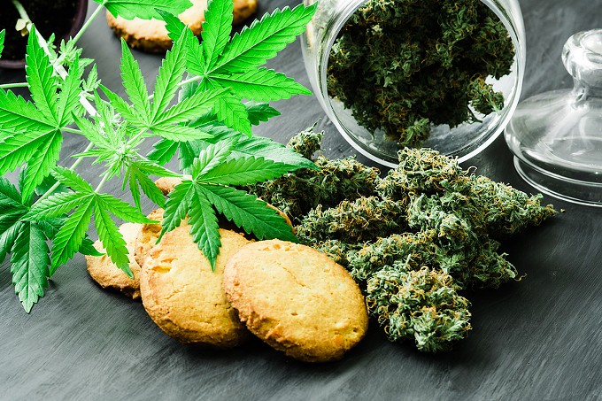 bigstock-cookies-with-cannabis-and-buds-242913877.jpg