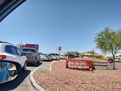 Long lines were the norm for the first few days of business amid the COVID-19 orders from Governor Ducey. - TARA FOULKROD